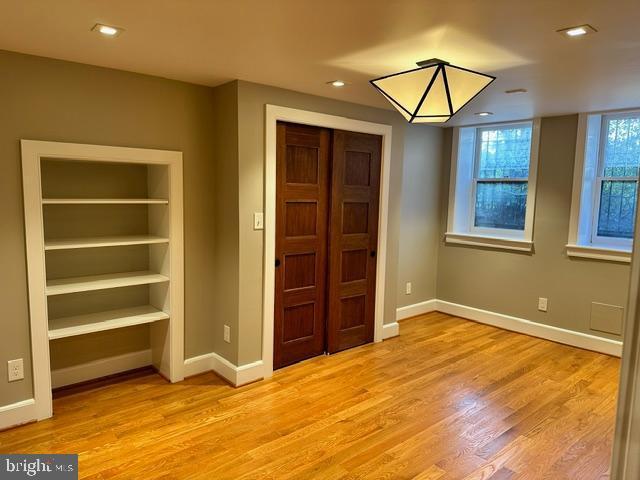 1750 S St NW Unit 1, Washington, DC 20009 - unfurnished bedroom with light wood-style floors, a closet, and recessed lighting