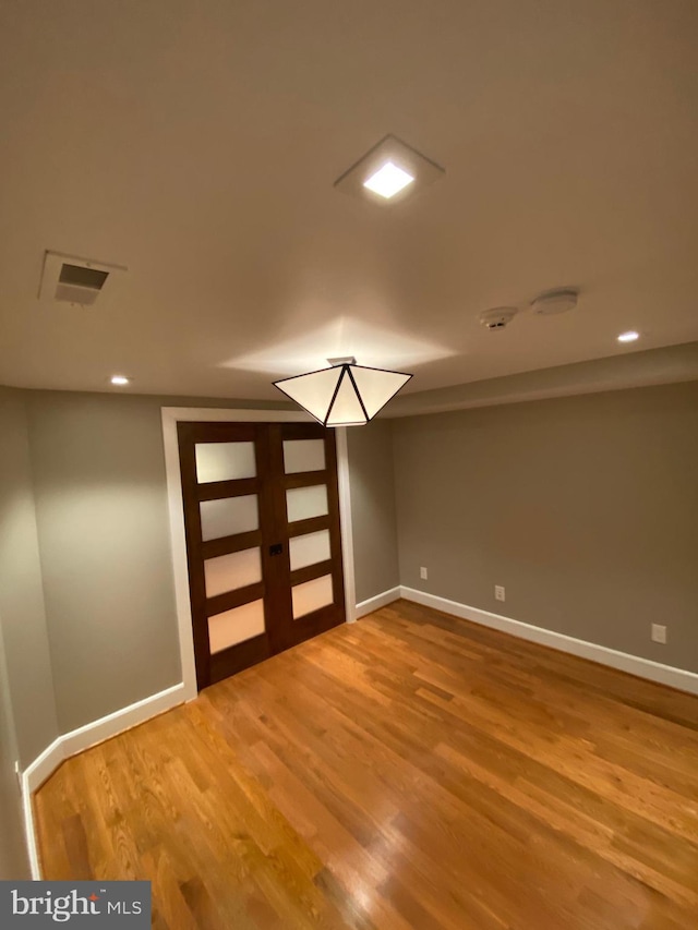 interior space with hardwood / wood-style floors