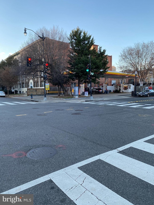 1750 S St NW Unit 1, Washington, DC 20009 - view of asphalt road featuring street lighting, sidewalks, and curbs