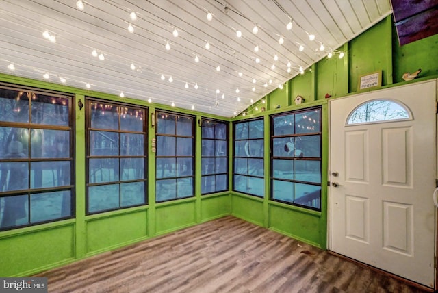 interior space featuring vaulted ceiling