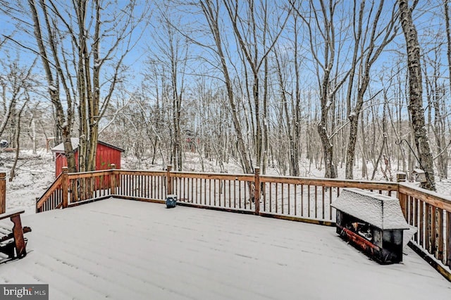 view of snow covered deck