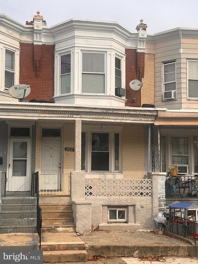 view of property with covered porch