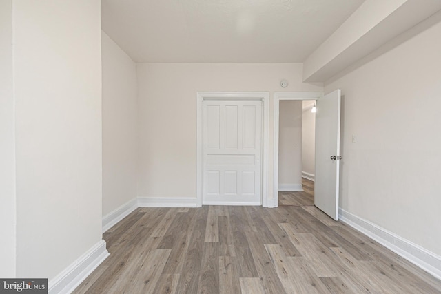 unfurnished bedroom with light hardwood / wood-style floors