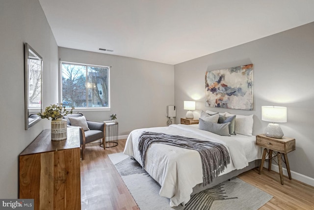 bedroom featuring light hardwood / wood-style floors