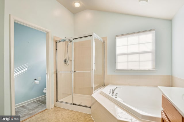 full bathroom with vanity, plus walk in shower, lofted ceiling, and toilet