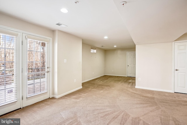 basement with light carpet