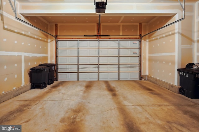 garage featuring a garage door opener