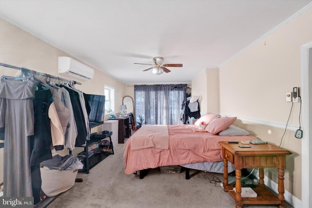 bedroom with ceiling fan, crown molding, light carpet, and a wall mounted air conditioner