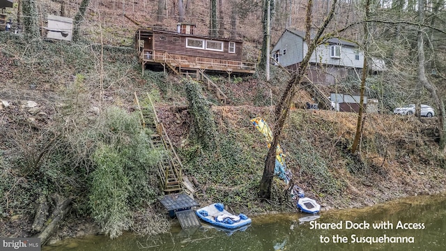 drone / aerial view featuring a water view