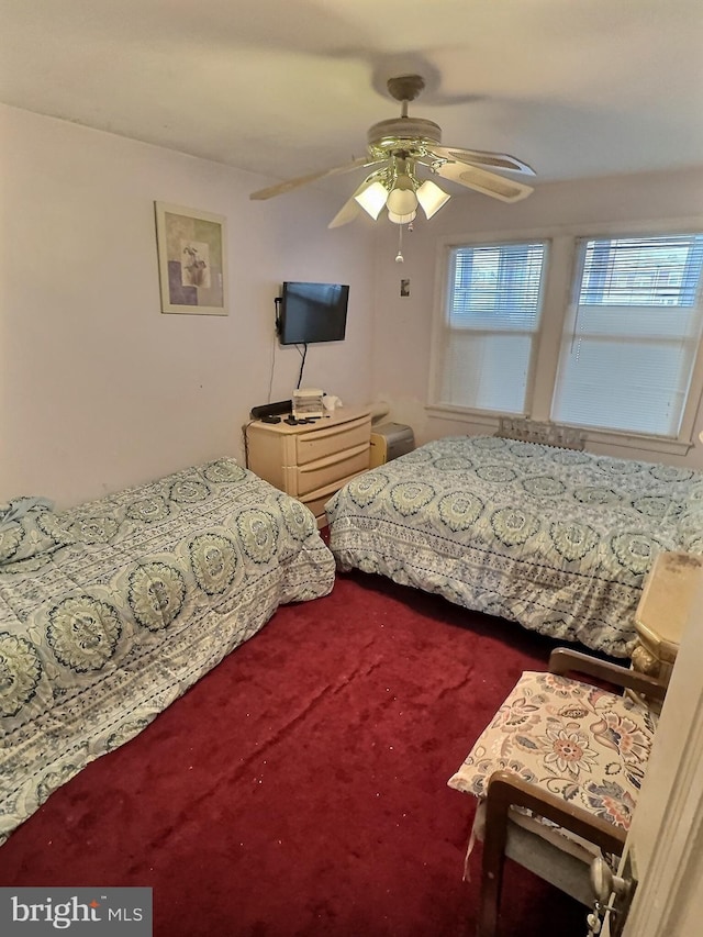 bedroom featuring carpet flooring and ceiling fan