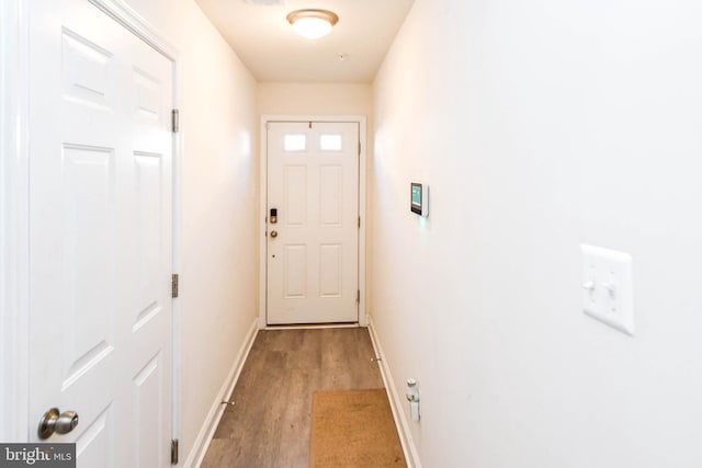 doorway to outside featuring hardwood / wood-style flooring