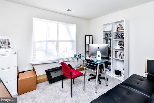 view of carpeted office space