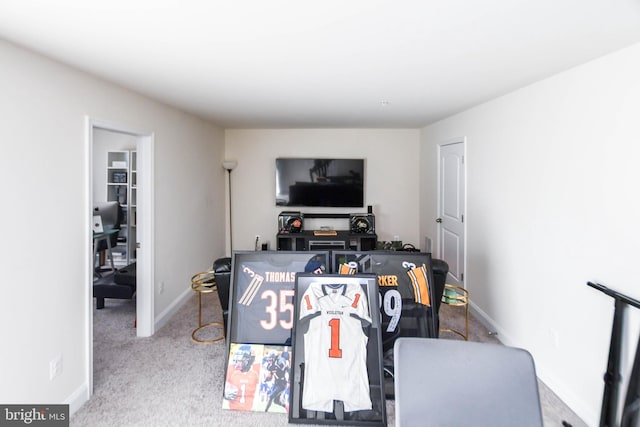 game room with light colored carpet