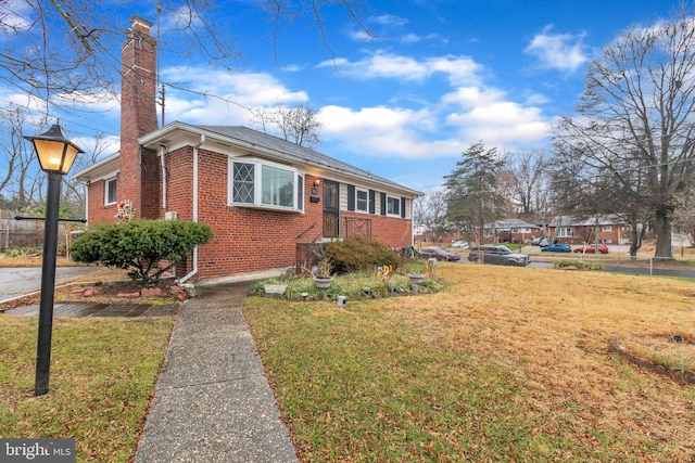 bungalow with a front yard