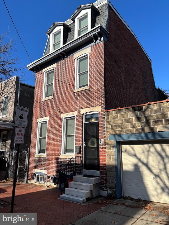 view of front of home featuring a garage