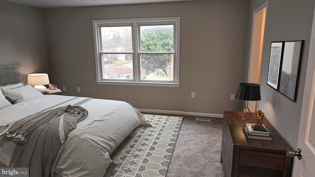 bedroom featuring carpet