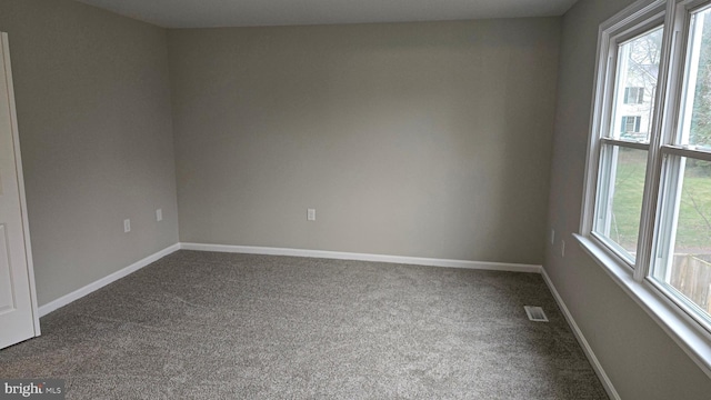 view of carpeted spare room