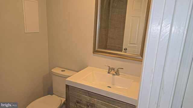 bathroom with vanity and toilet