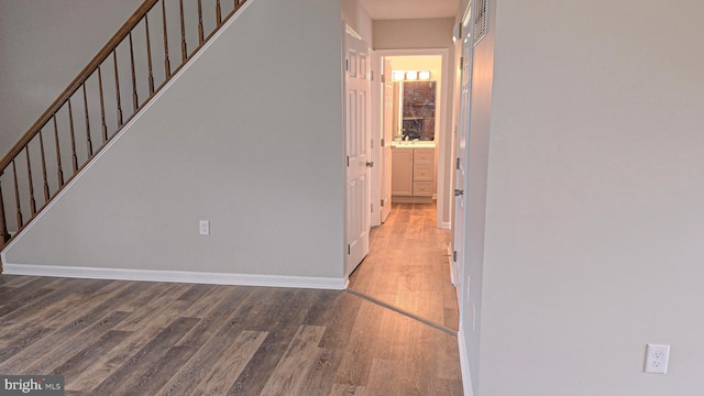 hallway featuring wood-type flooring