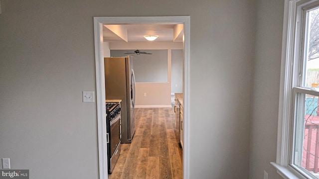 hallway featuring hardwood / wood-style floors