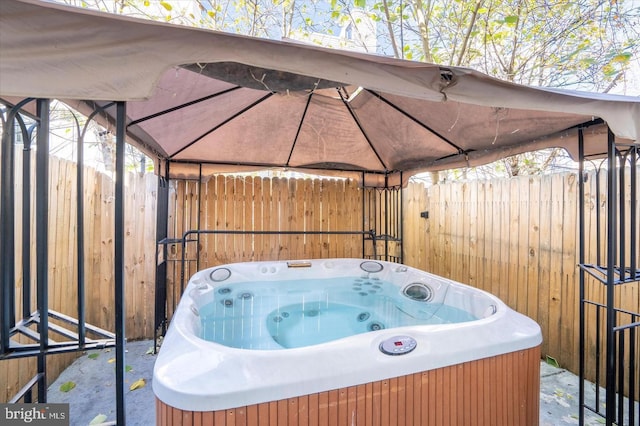 view of patio featuring a hot tub