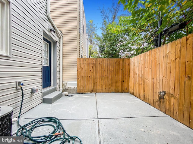 view of patio with cooling unit