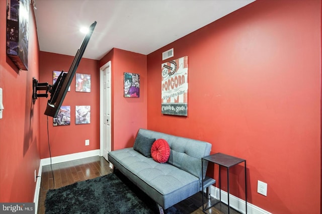 living area featuring dark hardwood / wood-style floors