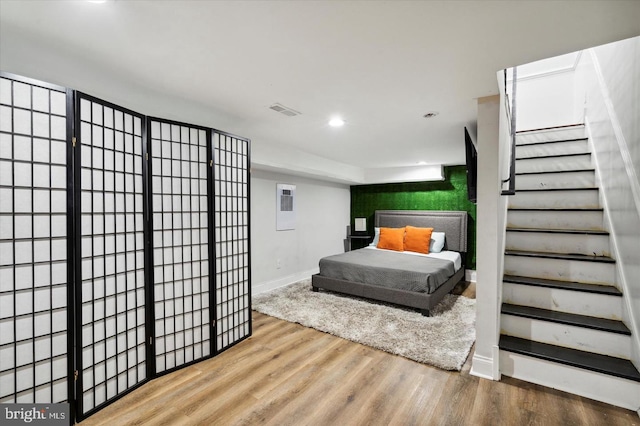 bedroom with wood-type flooring