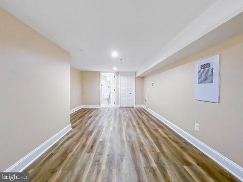 basement with wood-type flooring