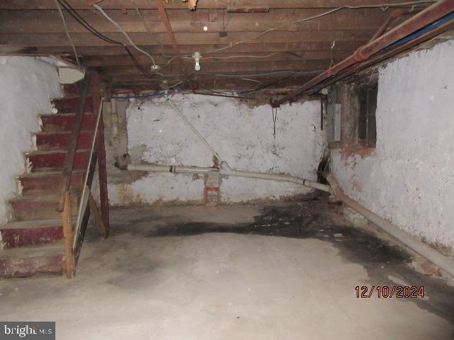 basement with electric panel