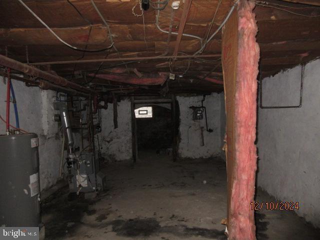 basement featuring water heater