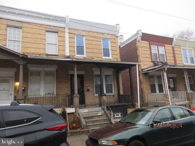 multi unit property featuring covered porch