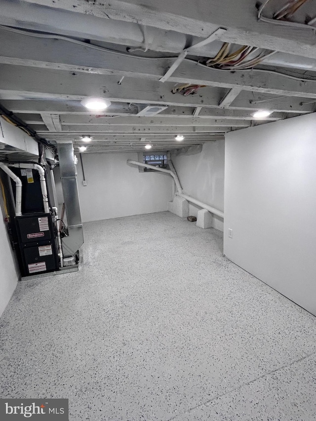 basement featuring heating unit