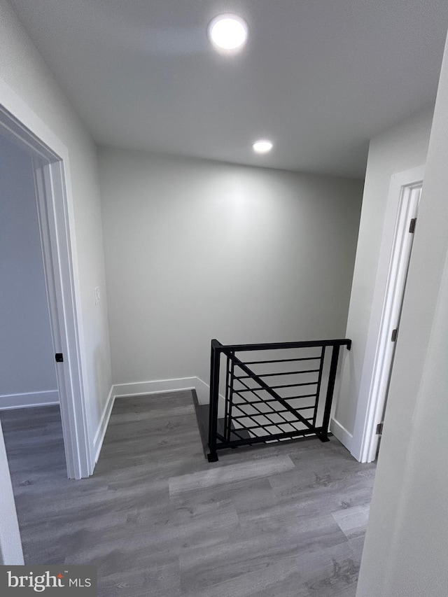 stairway with wood-type flooring