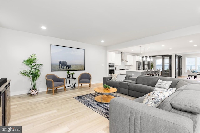 living room featuring light wood-type flooring