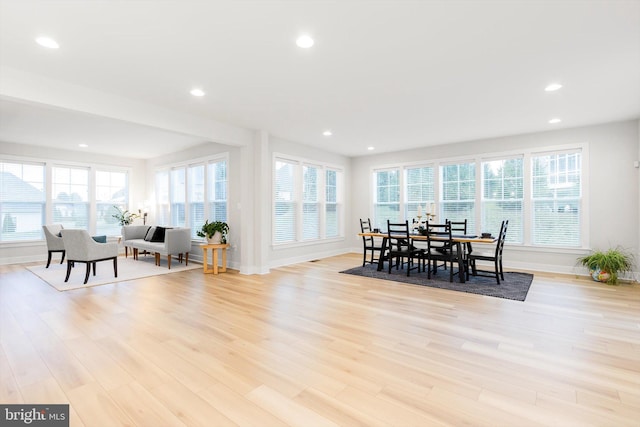 dining space featuring light wood-type flooring