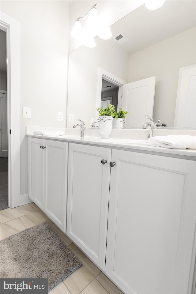 bathroom featuring vanity and tile patterned floors