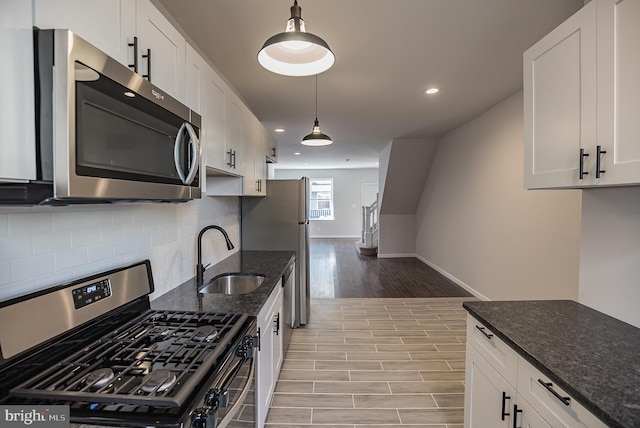 kitchen with white cabinets and stainless steel appliances