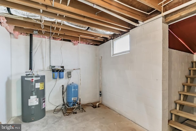 basement featuring electric water heater