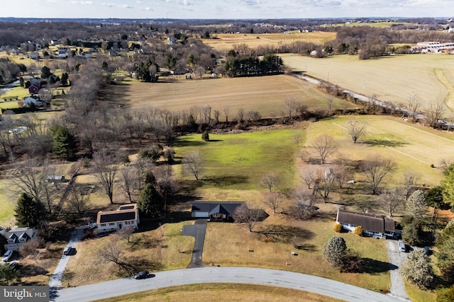 birds eye view of property featuring a rural view