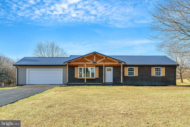 single story home with a garage and a front yard