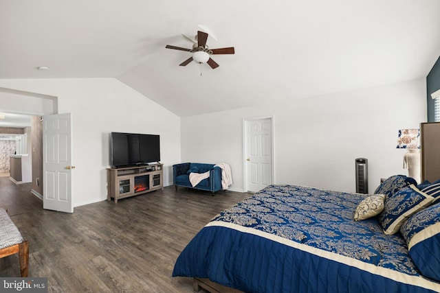 bedroom featuring lofted ceiling, ceiling fan, and dark hardwood / wood-style flooring