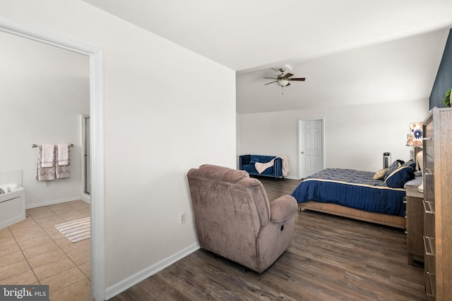 bedroom featuring ceiling fan and tile patterned floors