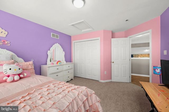 carpeted bedroom with a closet