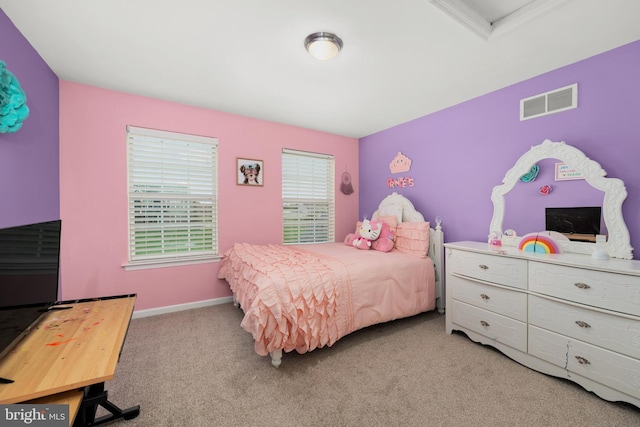 bedroom featuring light carpet