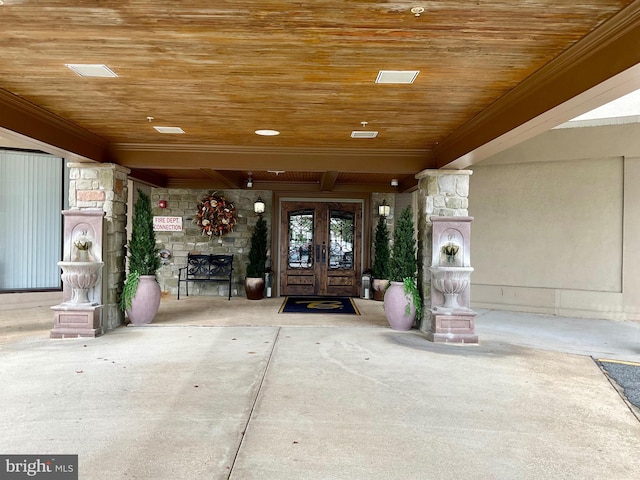 entrance to property featuring french doors