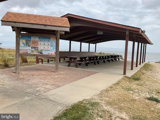 view of community with a water view