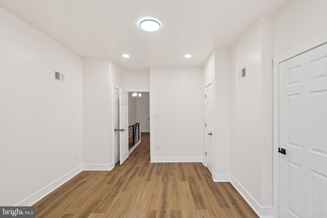 hall featuring hardwood / wood-style floors