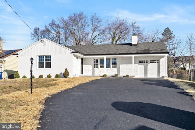 ranch-style house with a garage