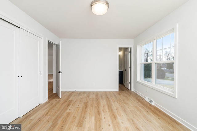 unfurnished bedroom featuring light hardwood / wood-style floors